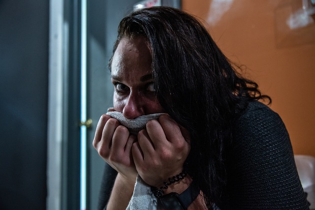 woman sweating from low blood sugar